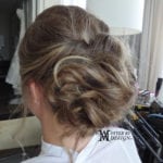 Elegant twisted updo hairstyle from the back.
