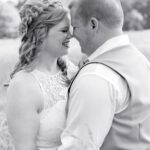 Couple sharing an intimate moment on their wedding day.