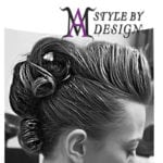 Black and white photo of an elegant hairstyle with decorative pins.