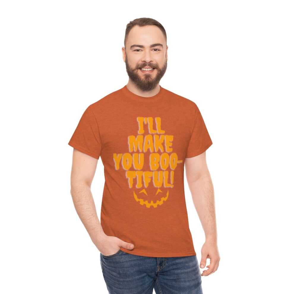 A man with beard and glasses wearing an orange shirt