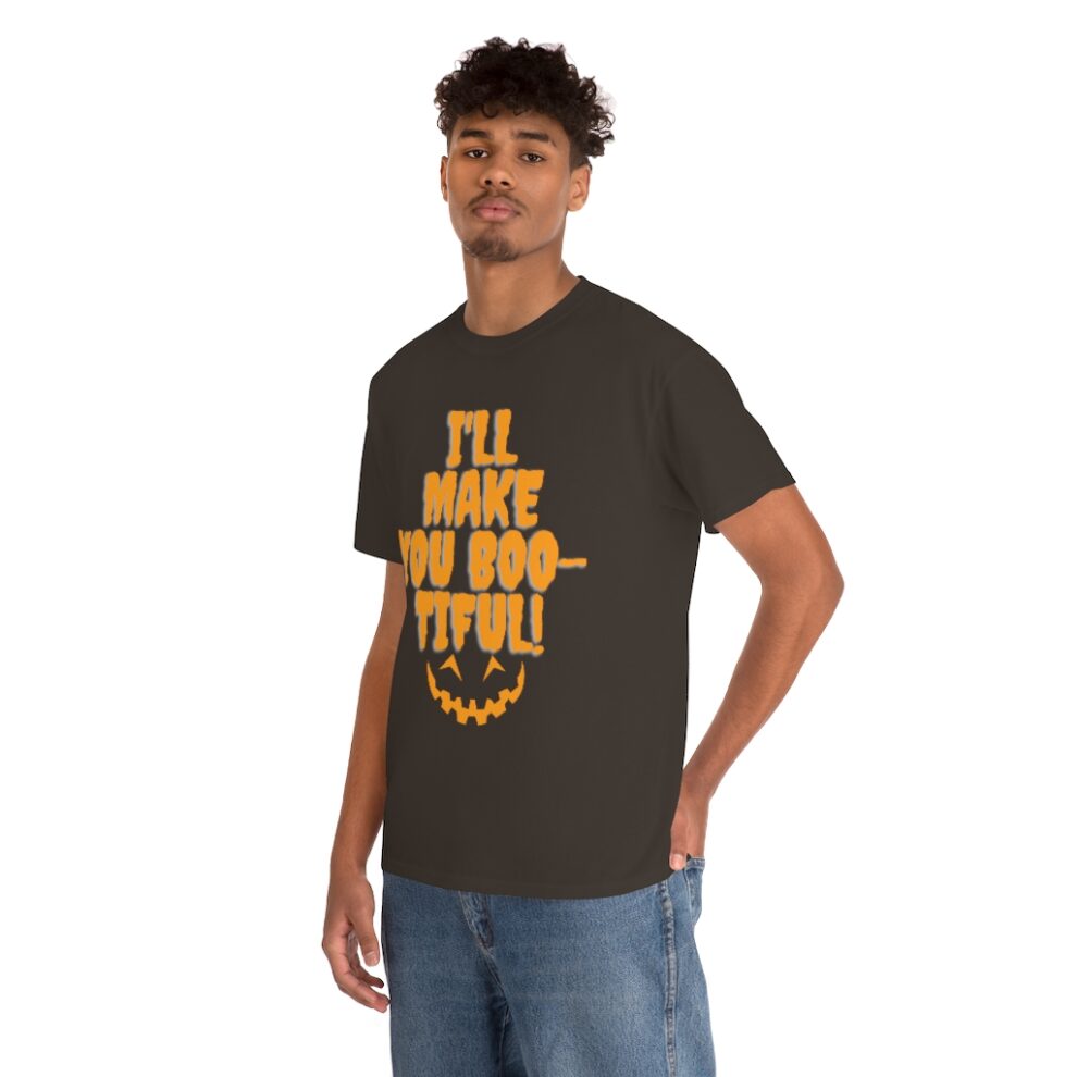 A man wearing a black t-shirt with the words " i 'll make you boo-tiful ".