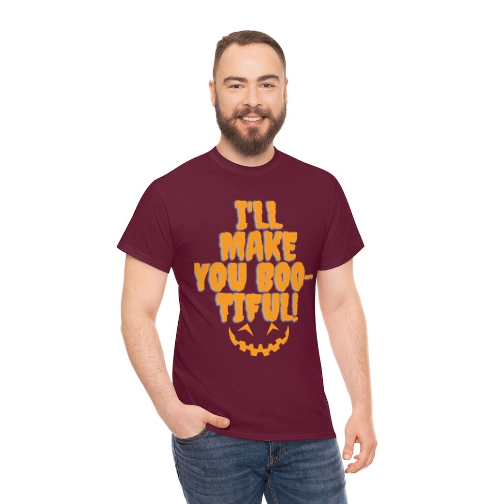 A man wearing a maroon t-shirt with the words " i 'll make you boo tiful ".