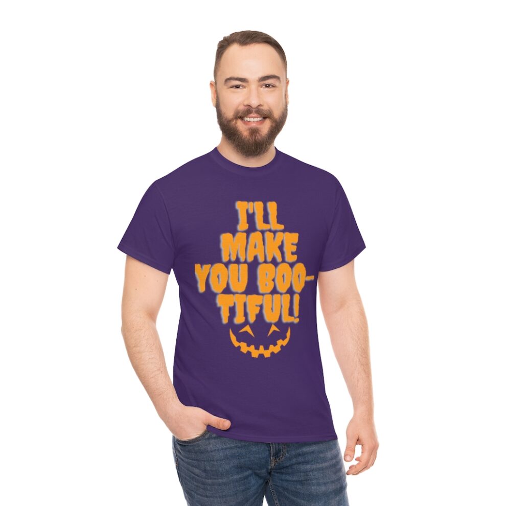 A man wearing a purple t-shirt with the words " i 'll make you out-tiful ".