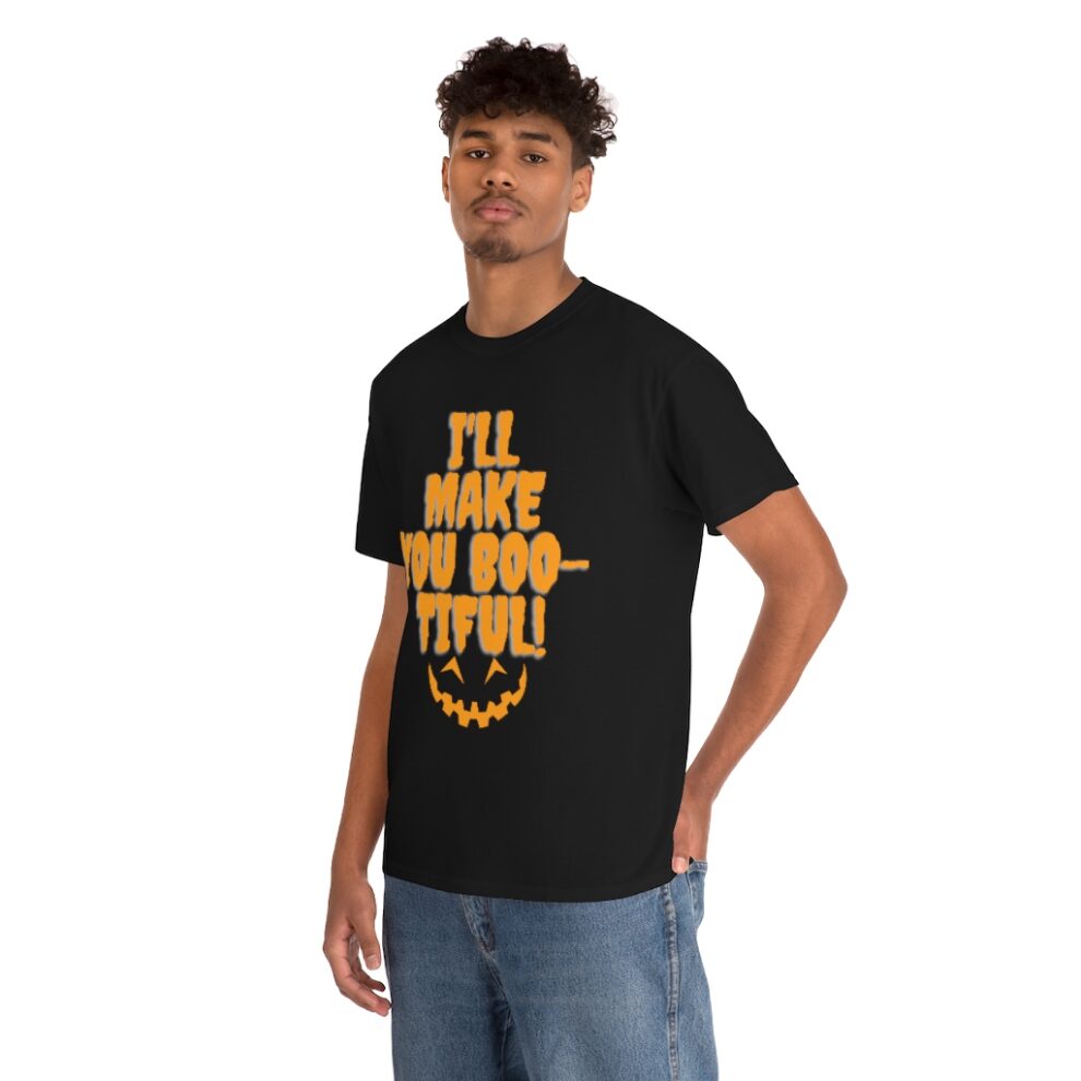 A man wearing a black t-shirt with the words " i 'll make you boo tiful ".
