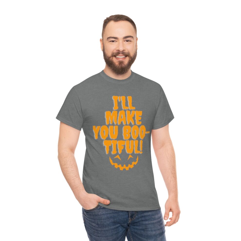 A man with beard and glasses wearing a t-shirt.