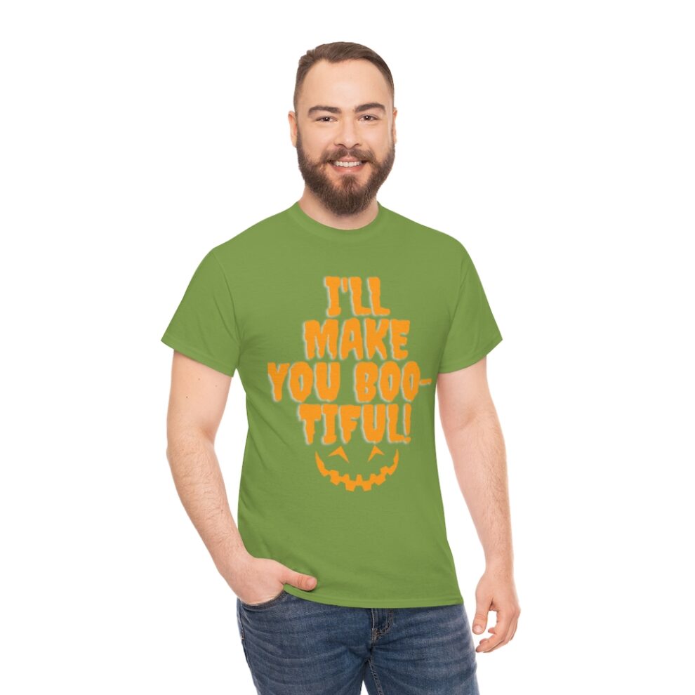 A man with beard and glasses wearing green shirt.