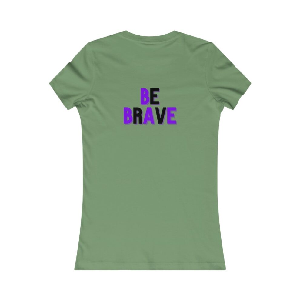A green t-shirt with the words be brave written in purple.