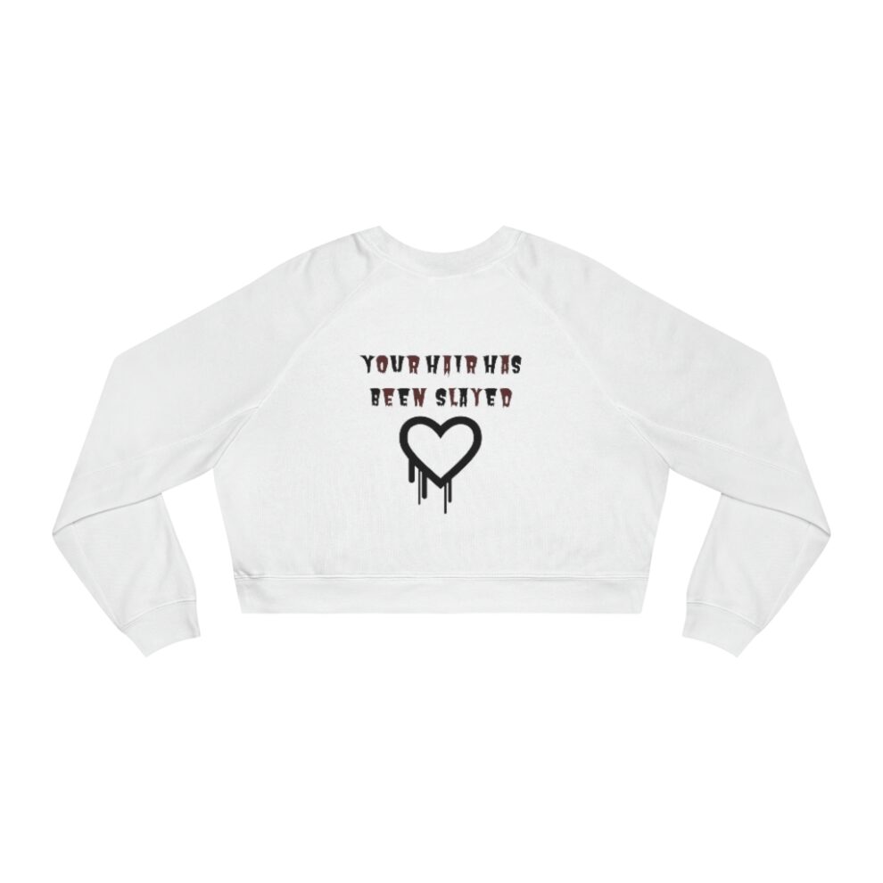 A white sweatshirt with a heart and the words " your life is worth more ".