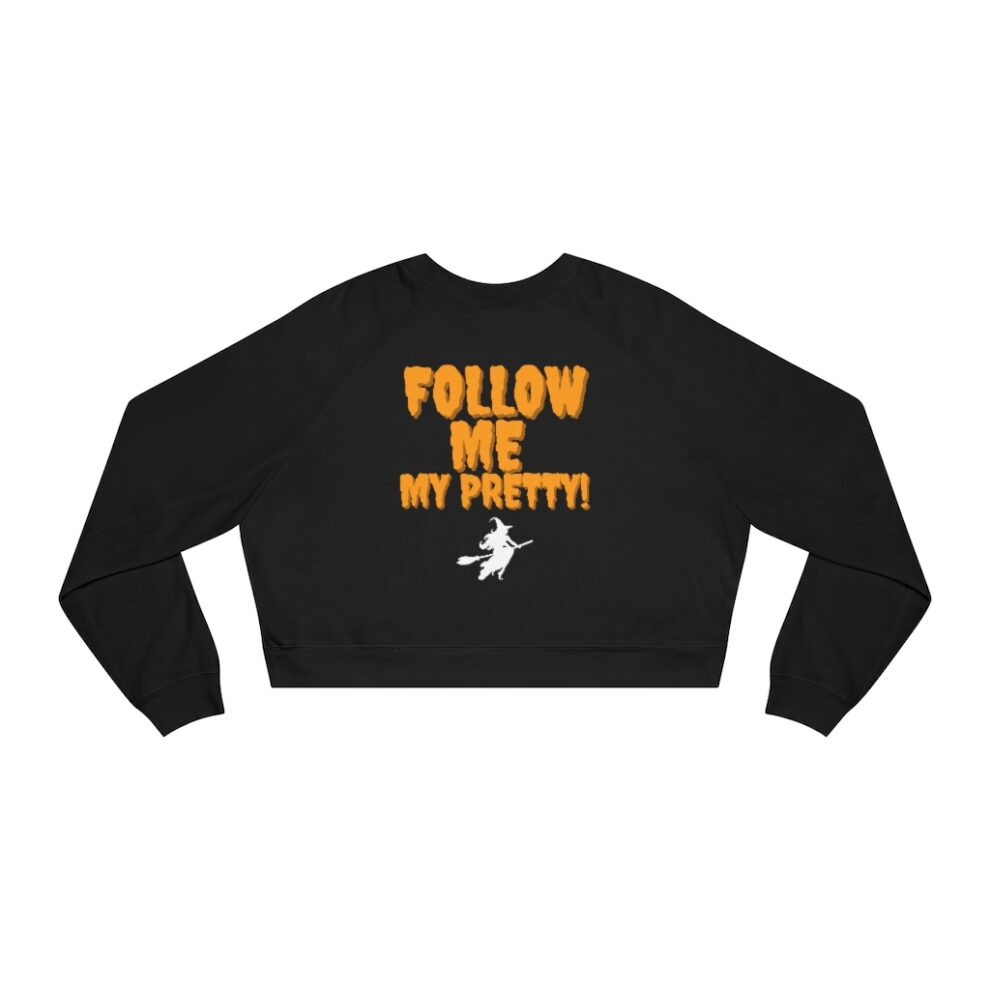 A black crop top with the words " follow me my pretty !" on it.