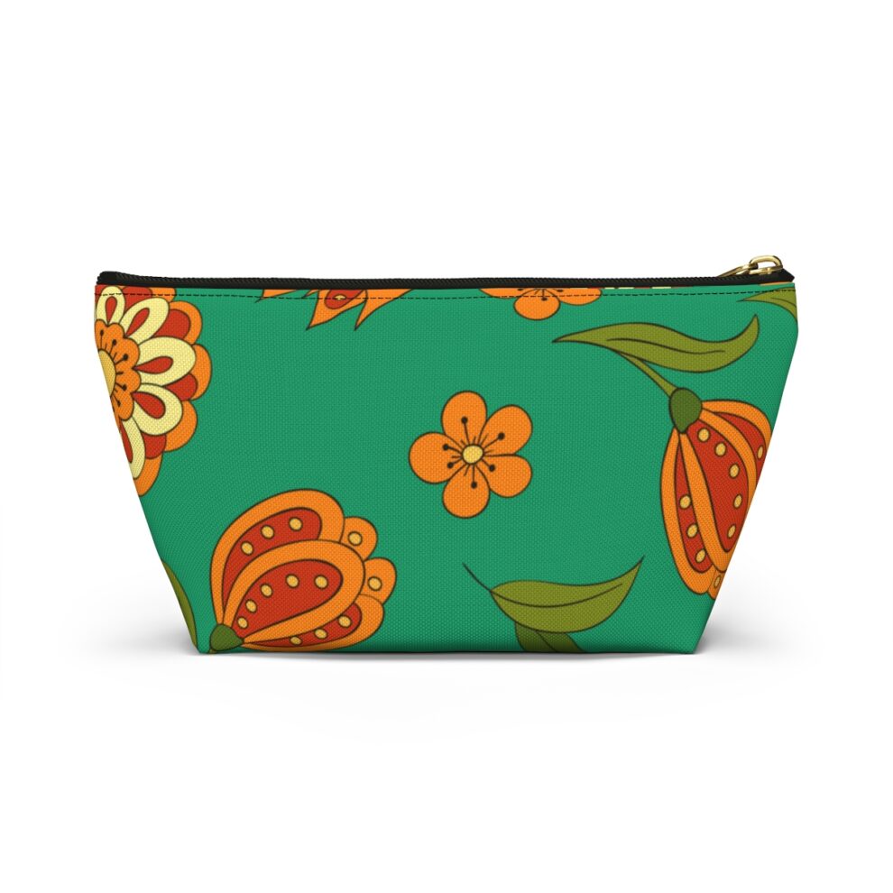 A green bag with orange and red flowers.
