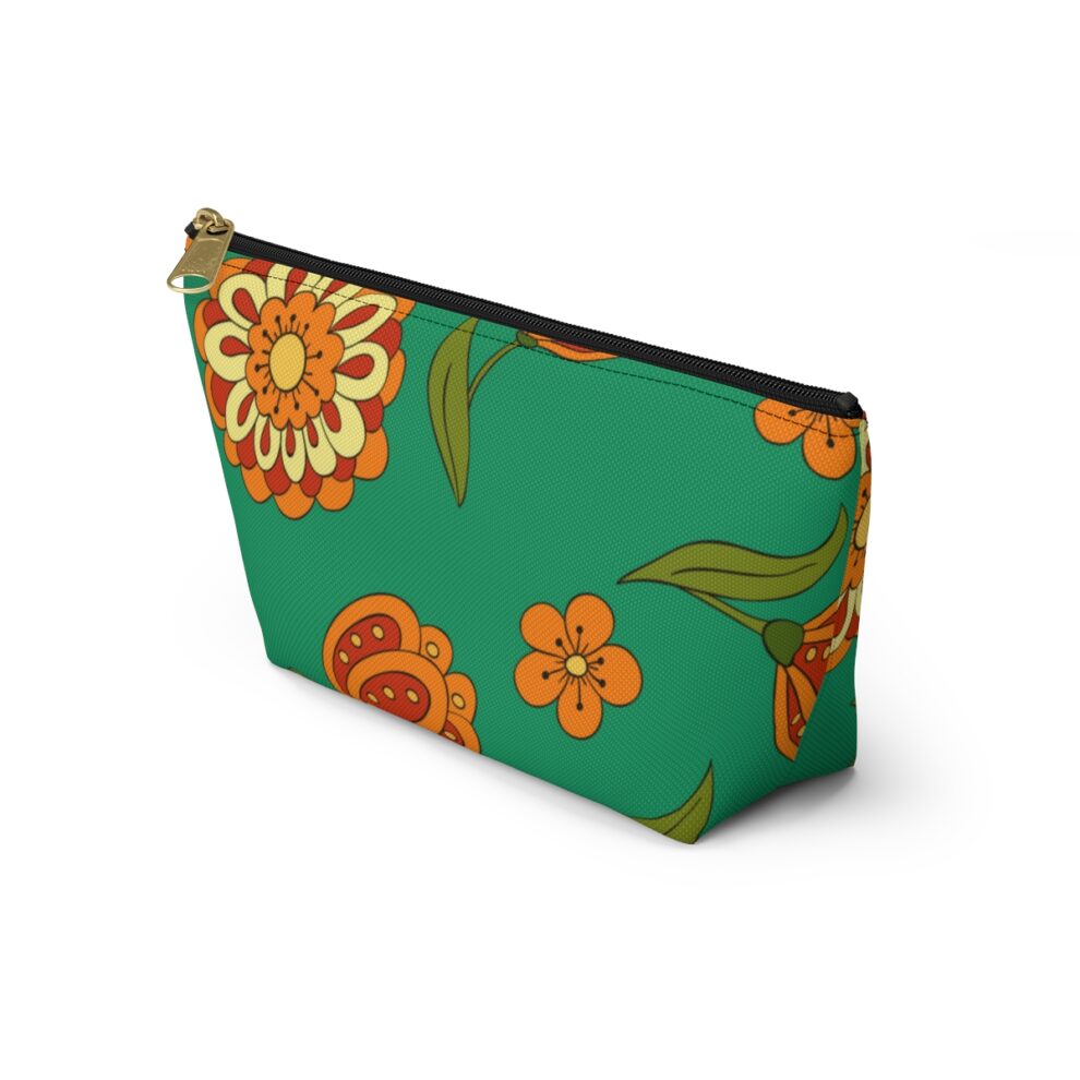 A green and orange floral pattern on this accessory pouch.