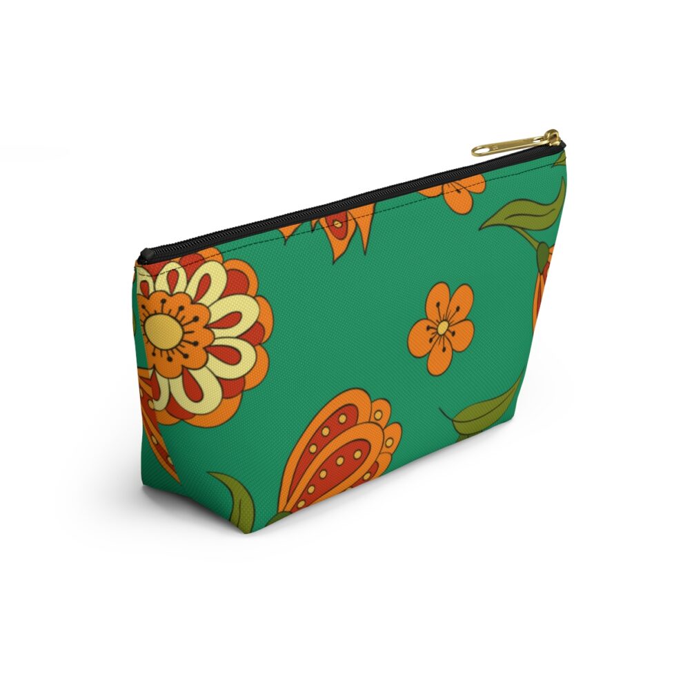 A green and orange floral pattern on this accessory pouch.