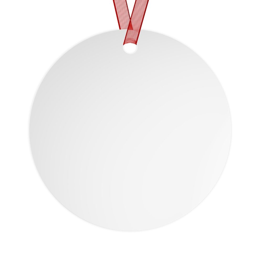 A round white ornament with a red ribbon.