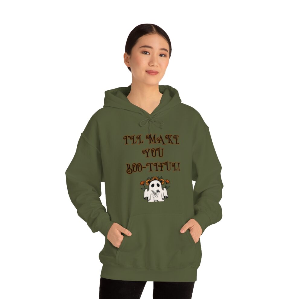 A woman in a green hoodie with the words " i 'll marry you bitch !" on it.