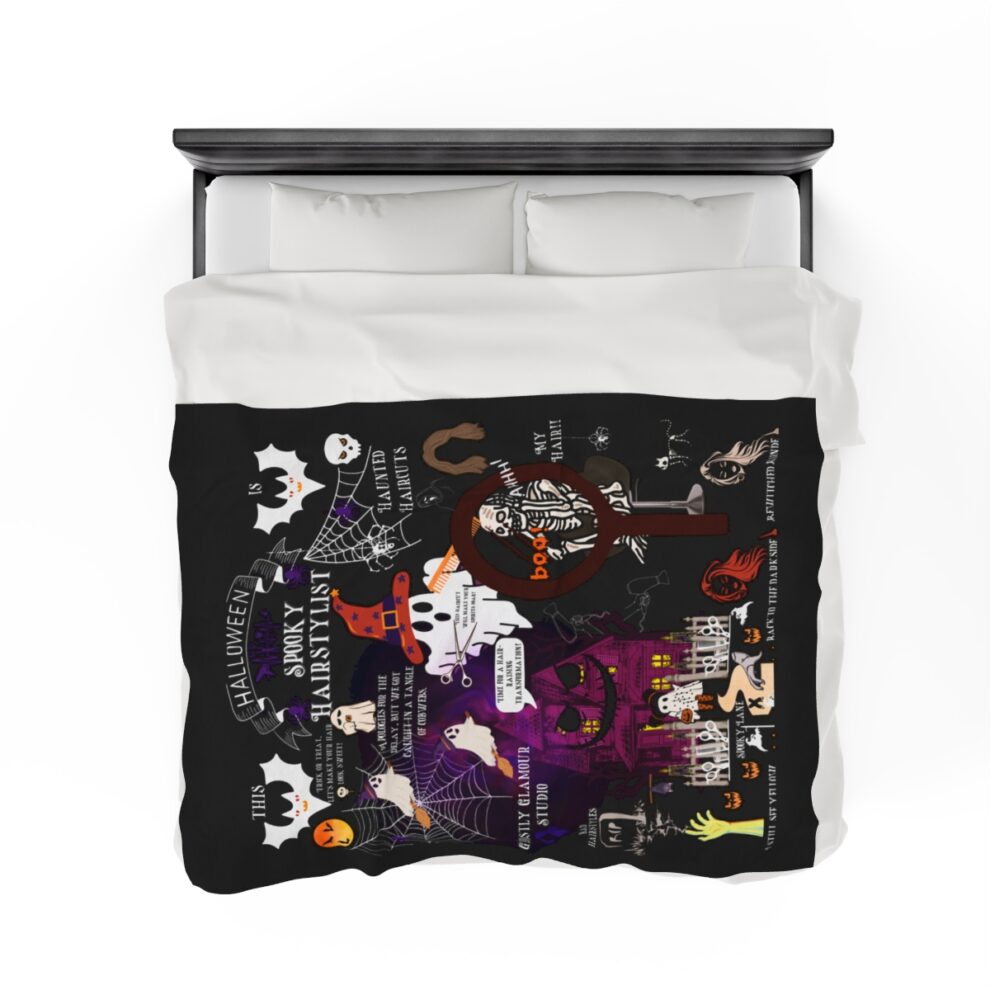 A black and white photo of a bed with a collage of pictures.