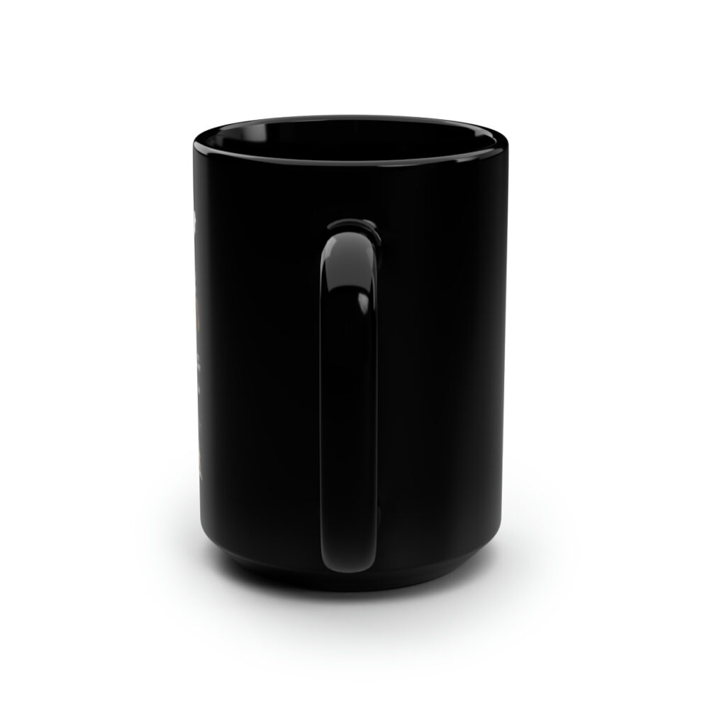 A black coffee cup with handle on white background.