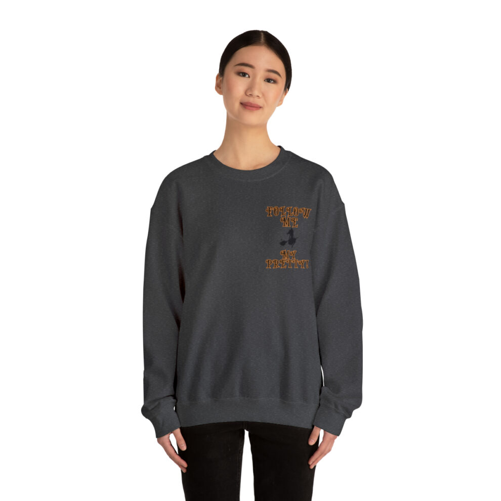 A woman wearing an embroidered sweatshirt
