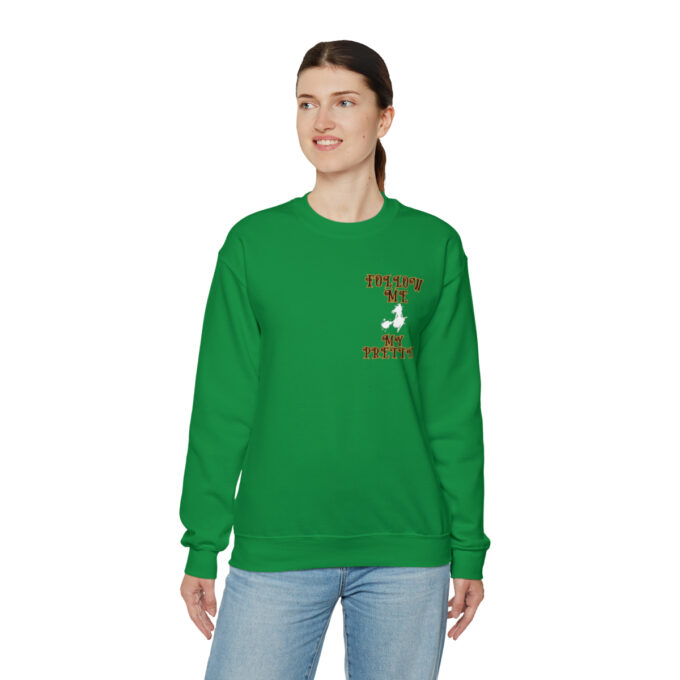A woman wearing a green sweatshirt with the words " you can 't touch this " on it.