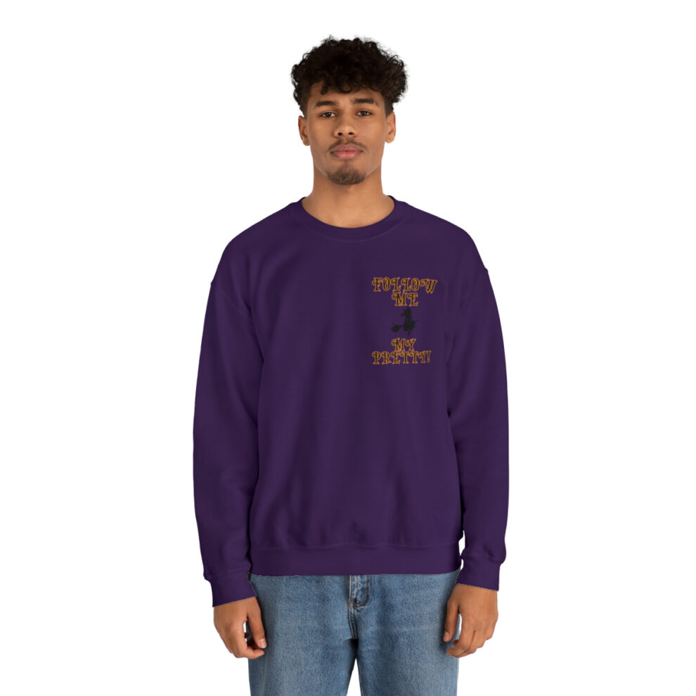 A man in purple sweatshirt with the words " i " on it.