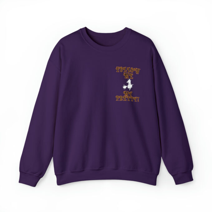 A purple sweatshirt with an image of a person 's head.