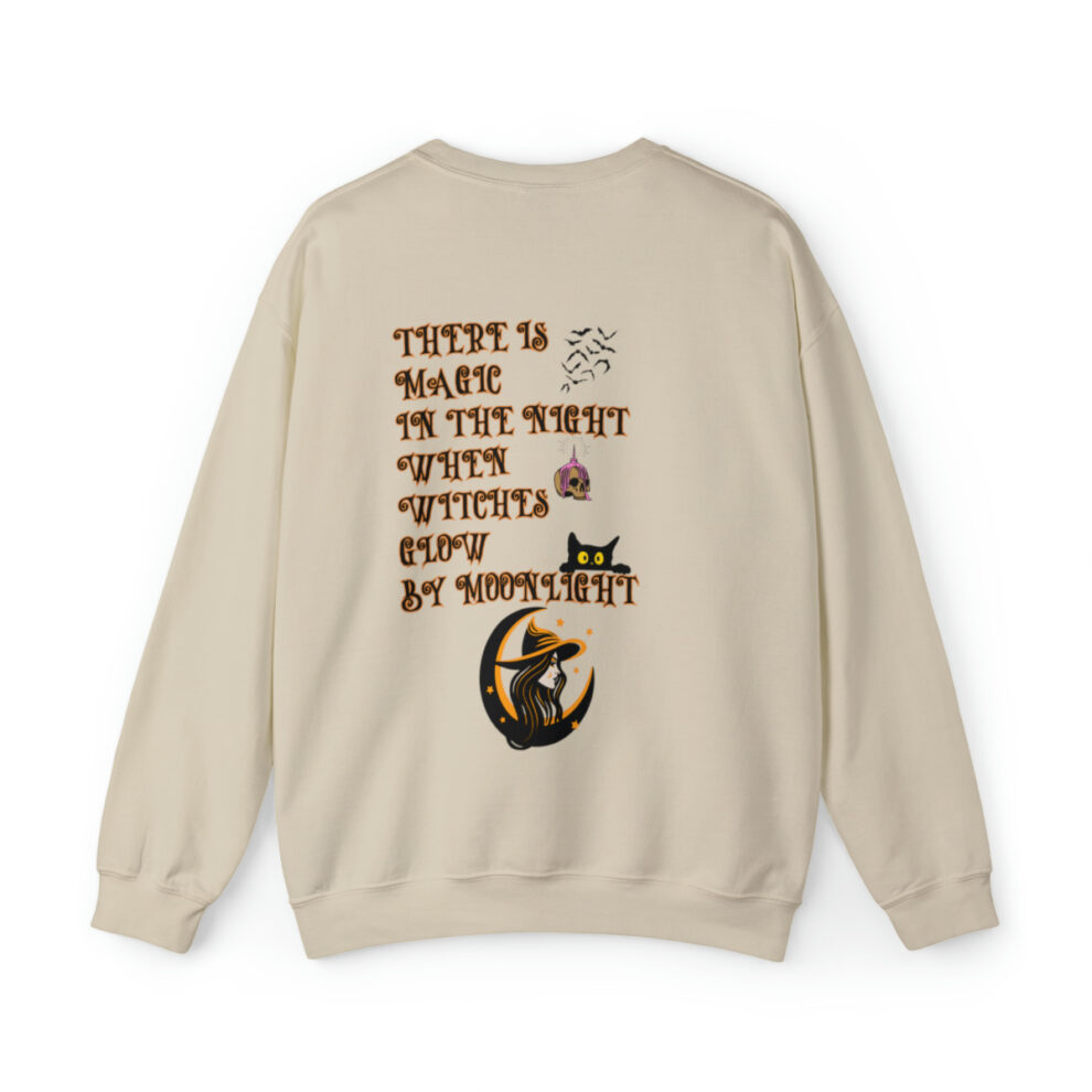 A beige sweatshirt with an image of a cat and words.