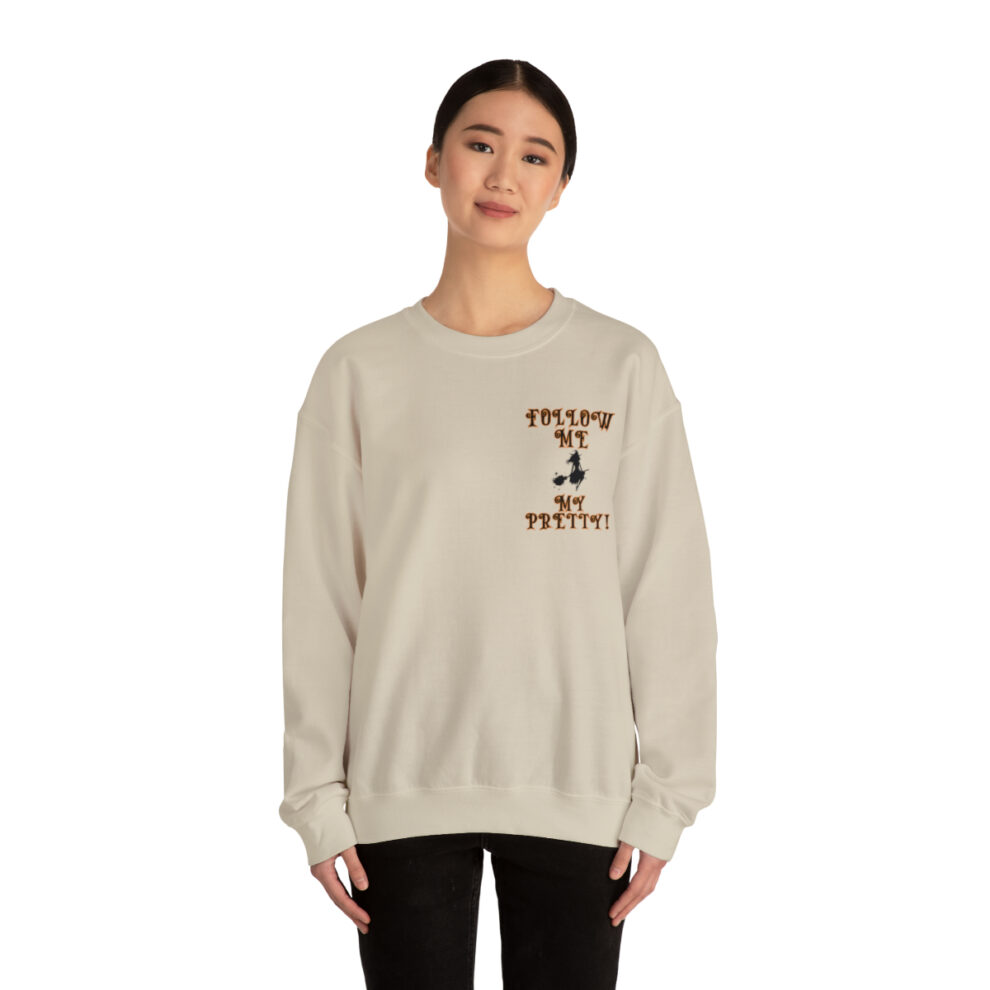 A woman wearing a sweatshirt with the words " fueled by passion ".