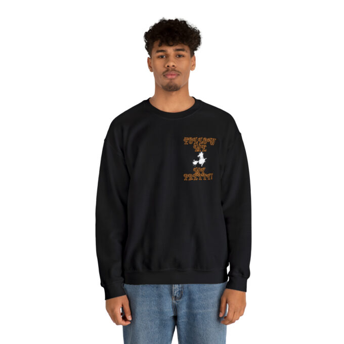 A man in black sweatshirt with brown lettering.