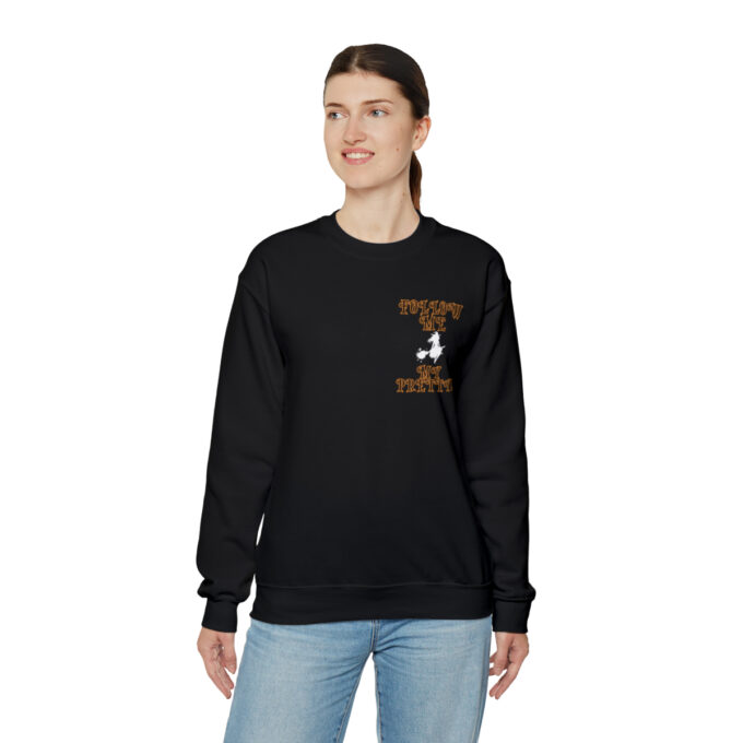 A woman wearing a black sweatshirt with the words " prison is hard to find ".