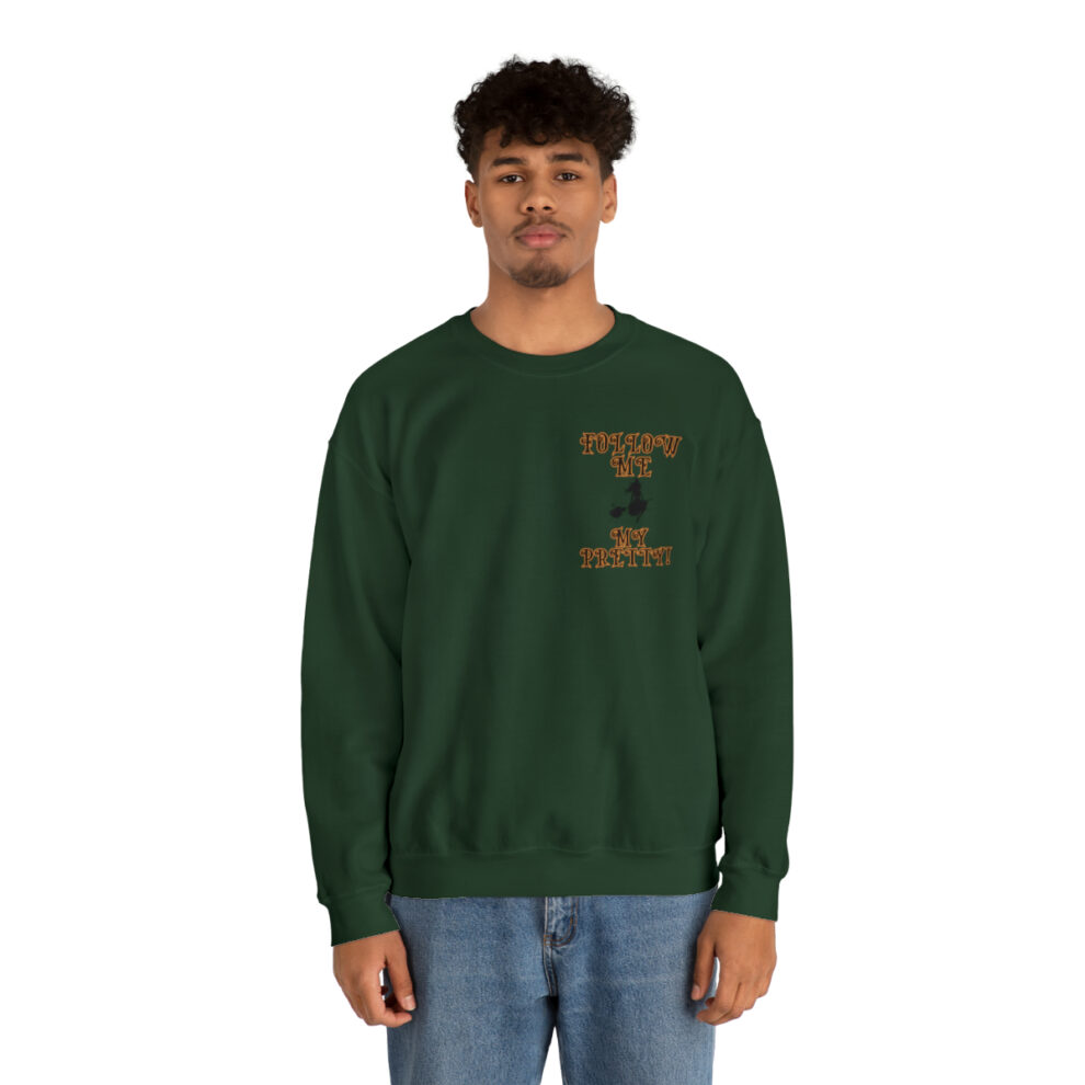 A man in a green sweatshirt with an i on the chest.