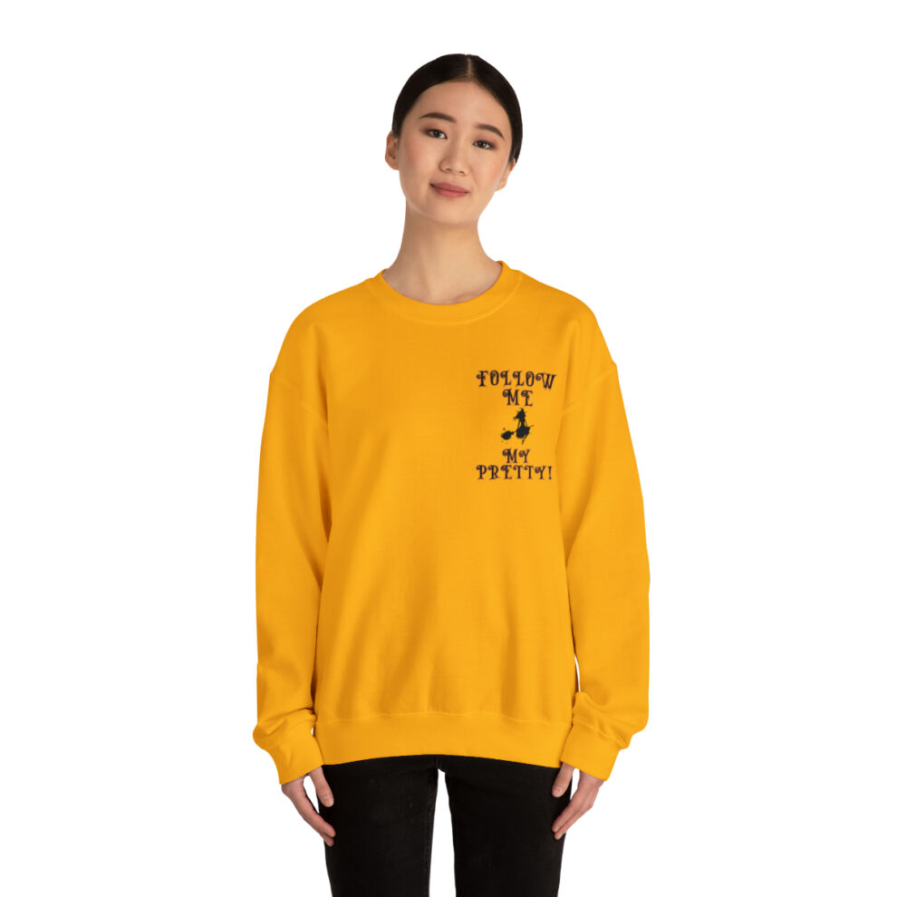 A woman wearing an orange sweatshirt with the words " proud to be yellow ".