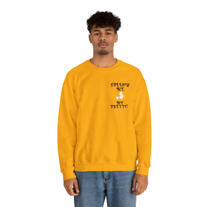 A man in yellow sweatshirt with words on it