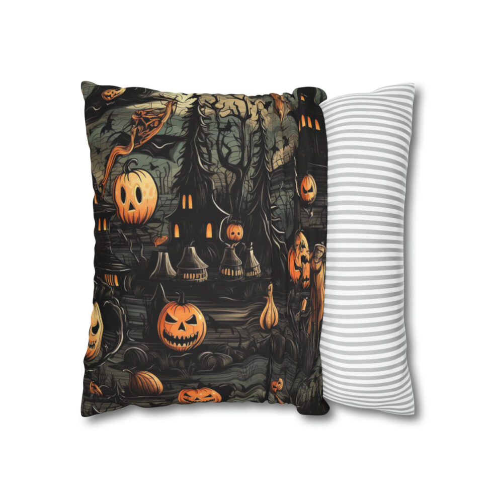 A pillow with a picture of pumpkins and trees.