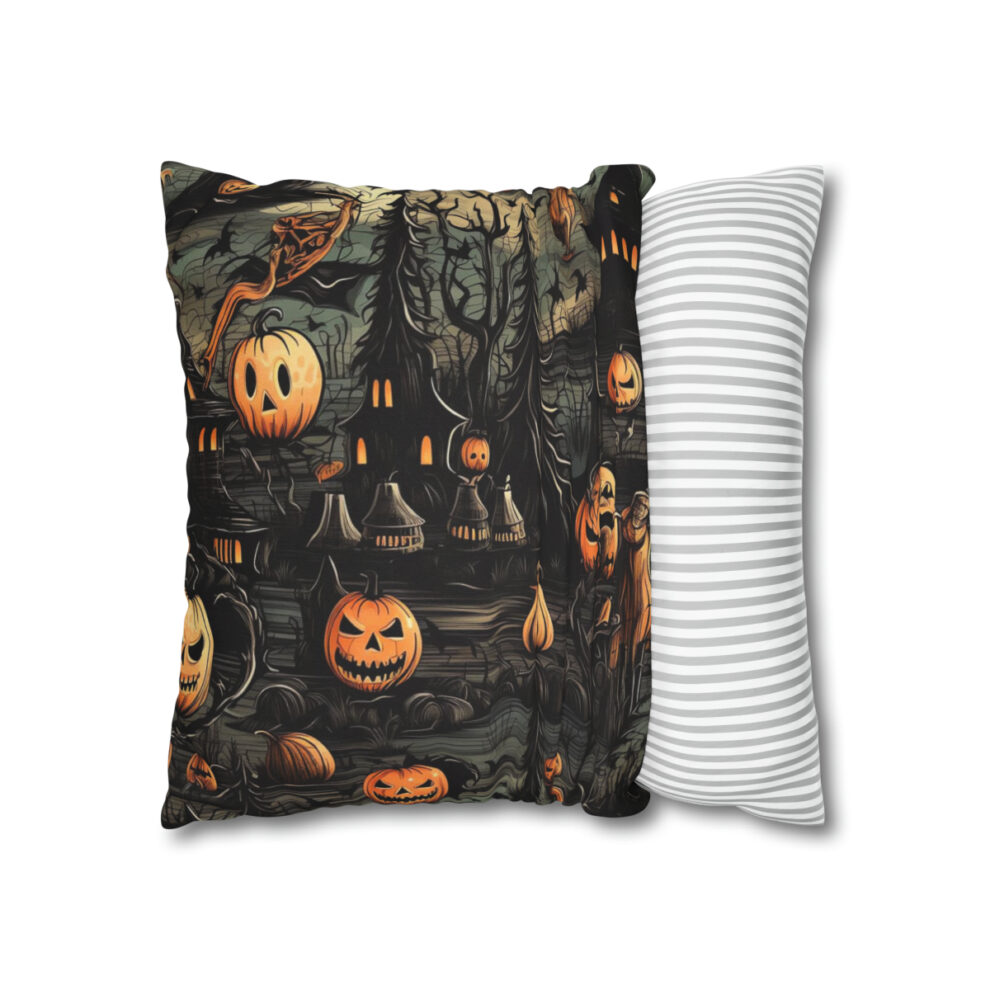 A pillow with a picture of pumpkins and bats.