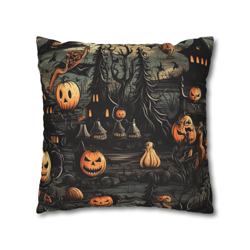 A pillow with a picture of pumpkins and trees.