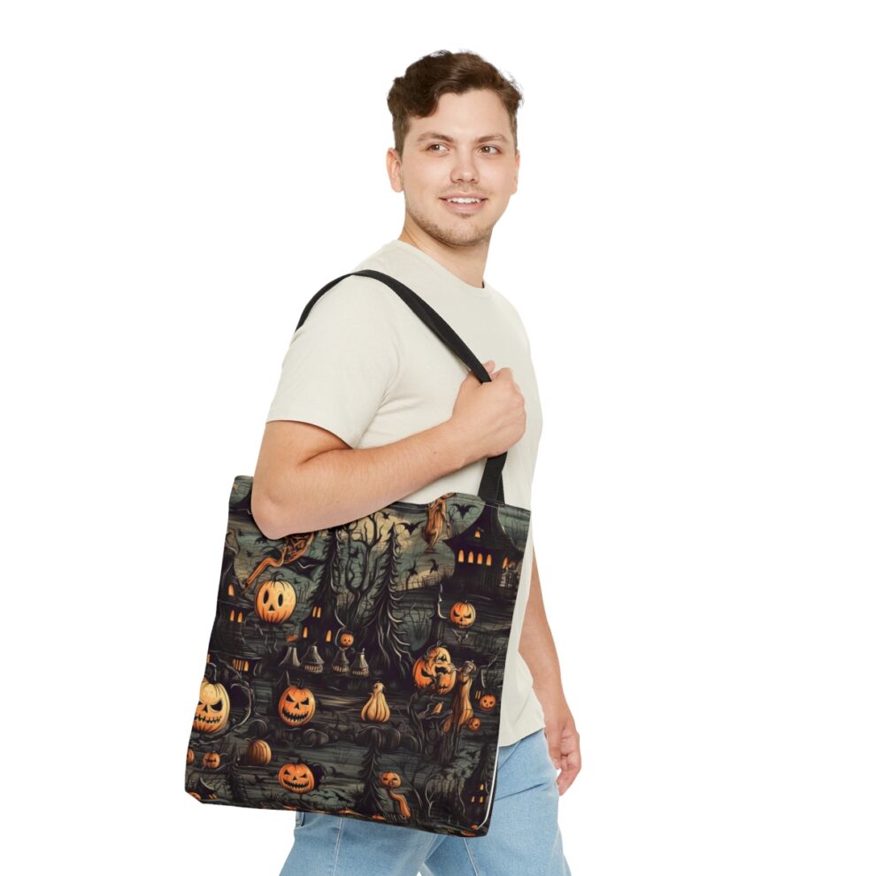 A man holding onto a bag with halloween print