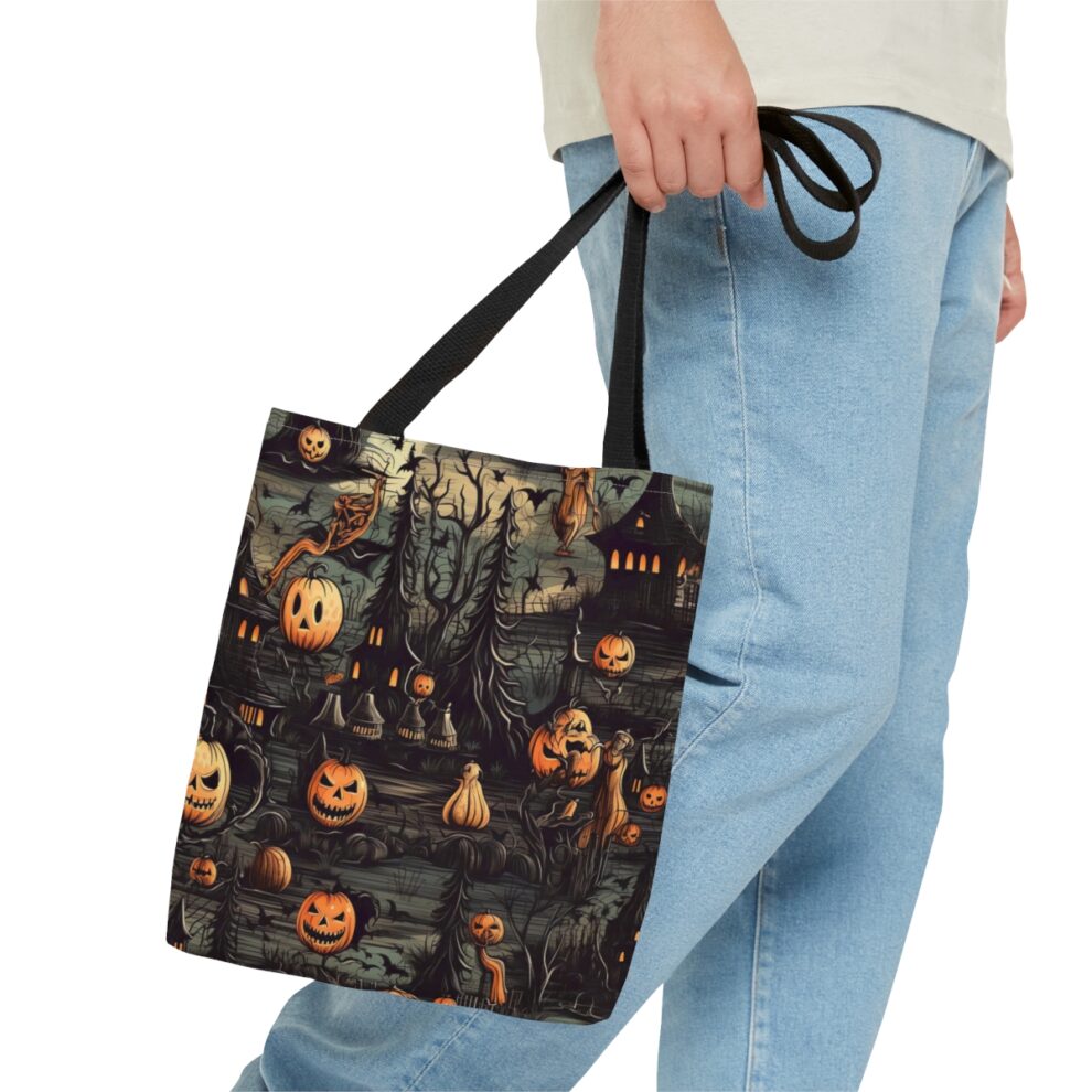 A person holding onto a bag with halloween themed fabric.