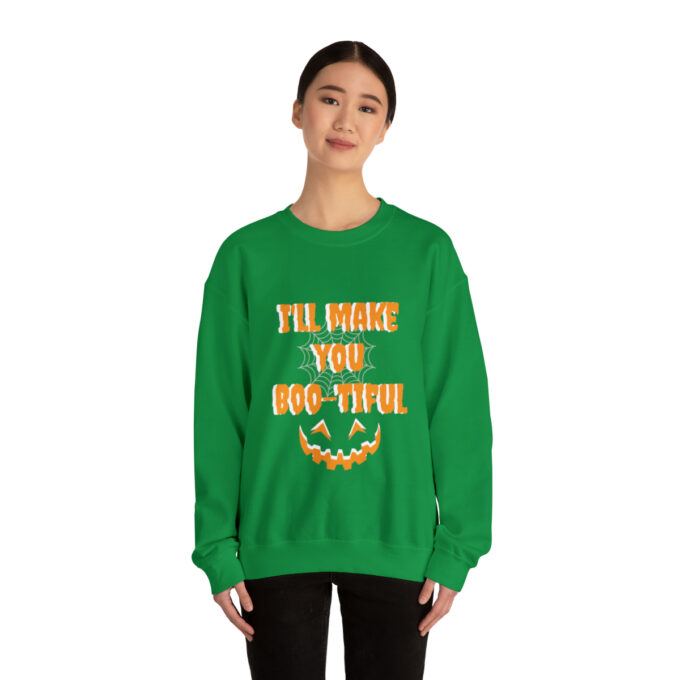 A woman wearing a green sweatshirt with the words " i 'll have you two-virile ".
