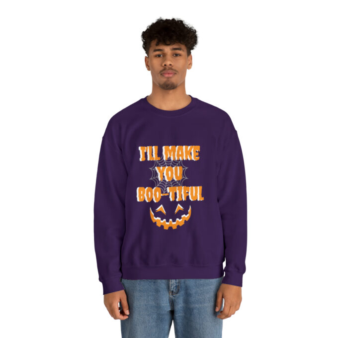 A man wearing a purple sweatshirt with the words " i 'll make you boo-tiful ".
