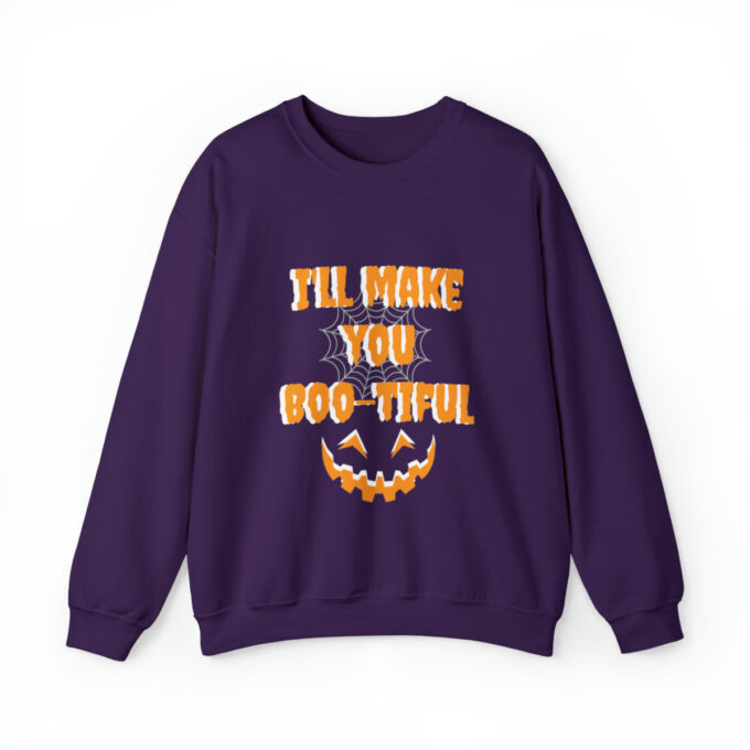 A purple sweatshirt with an image of a pumpkin.
