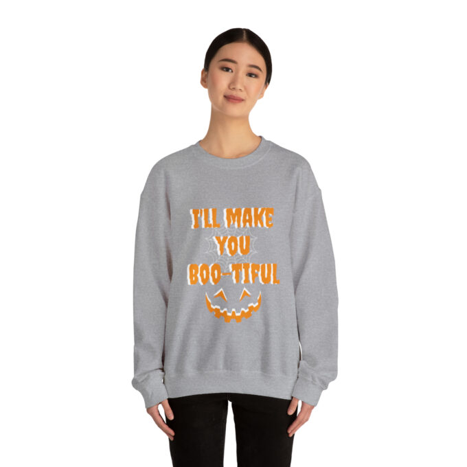 A woman wearing a sweatshirt that says " i 'll make you beg titus ".