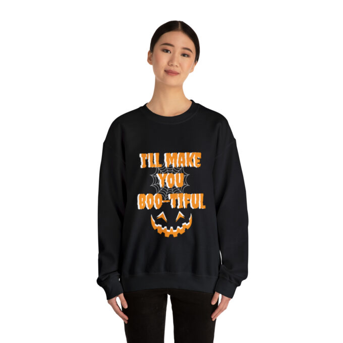 A woman wearing an orange and black sweatshirt.