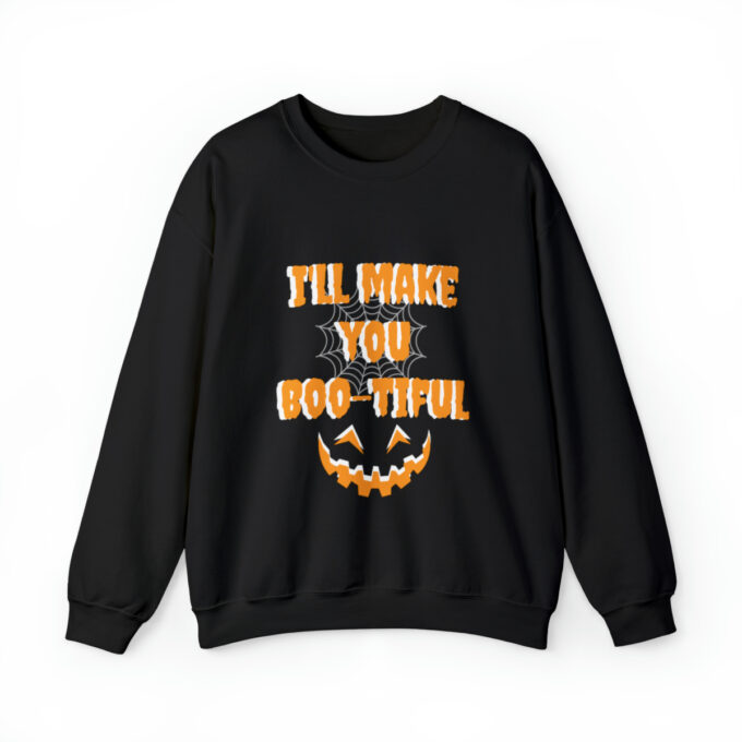 A black sweatshirt with an image of a pumpkin.