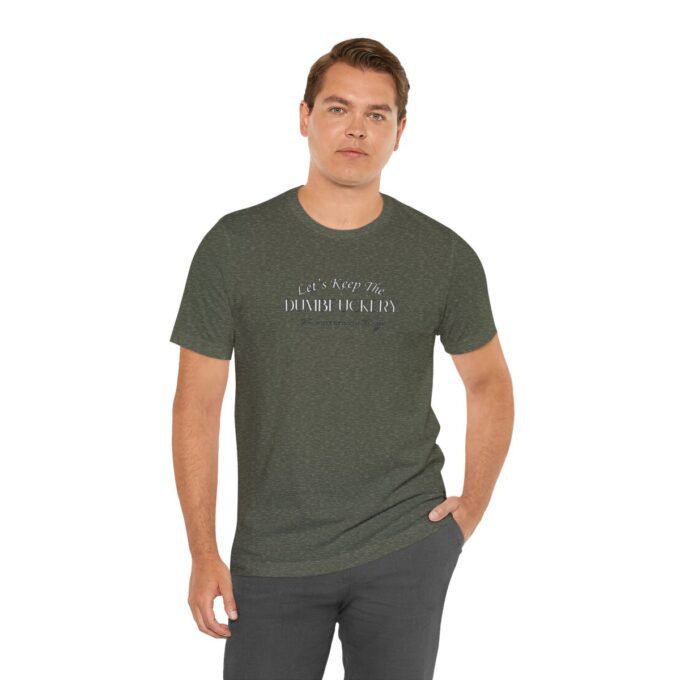 A man wearing a t-shirt with the words " let it be said ".