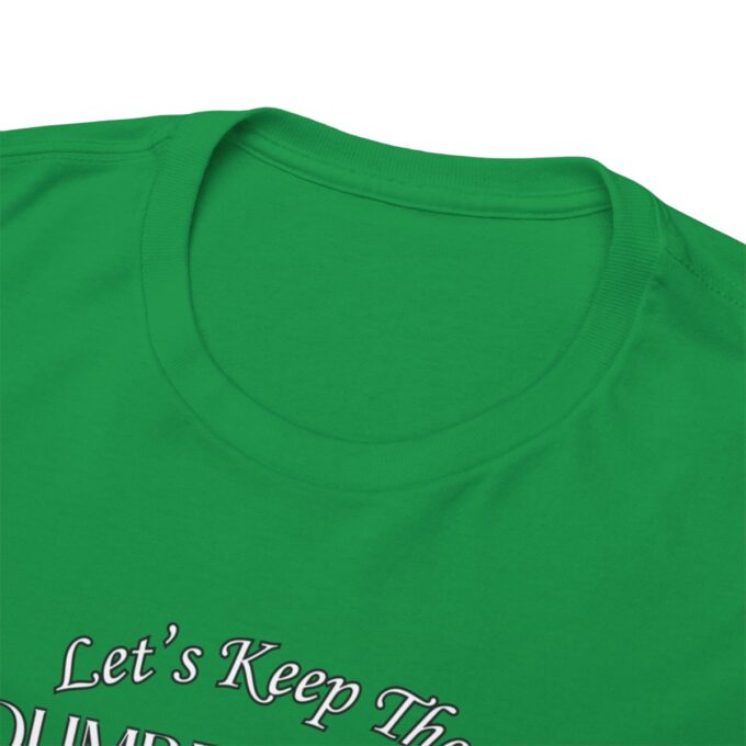 A close up of the lettering on a green shirt