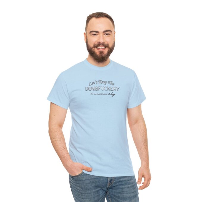 A man wearing a light blue t-shirt with the words " i can 't wait to go camping ".