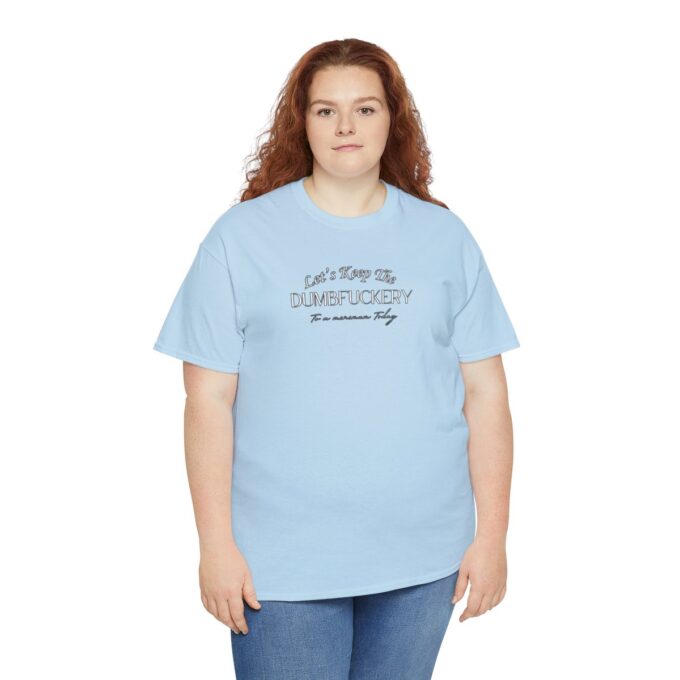 A woman wearing a light blue t-shirt with the words " i am proud to be american."