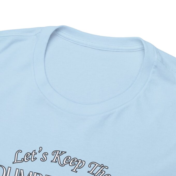 A close up of the words let 's keep the blues away on a shirt
