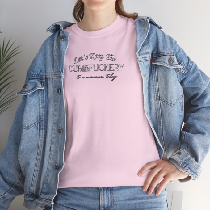 A woman in a pink shirt and jacket