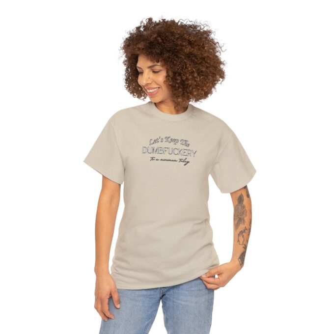 A woman with her hair in an afro is wearing a t-shirt.