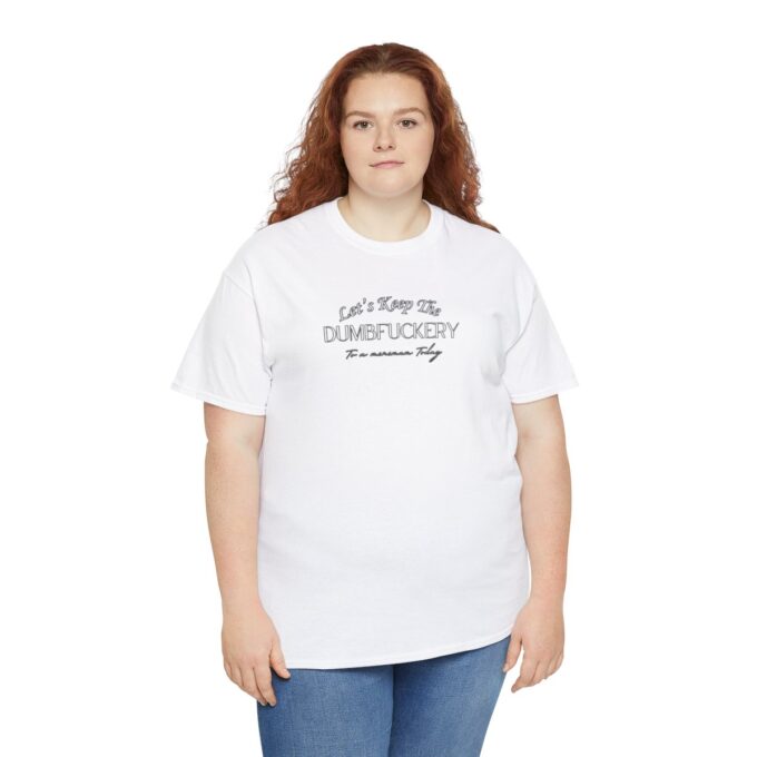 A woman wearing jeans and white shirt with text.